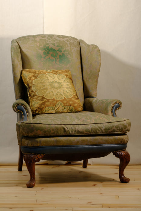 Antique Upholstered Wingback Chair