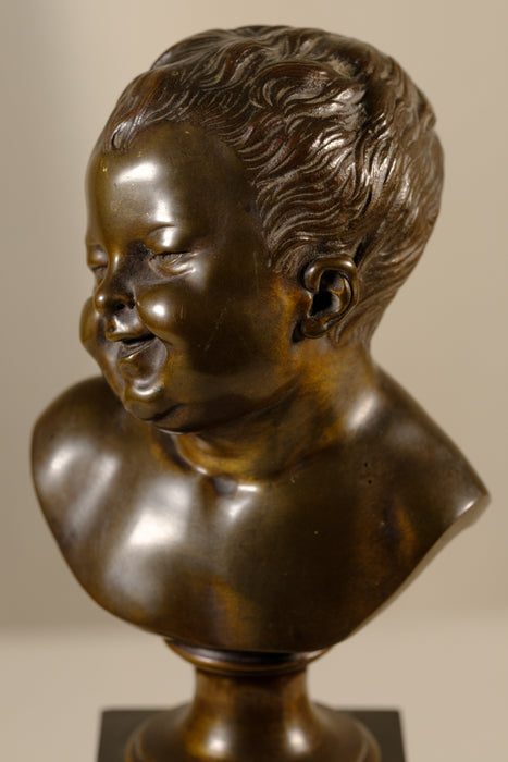 Bronze Statues of Laughing and Crying Infants