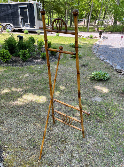 Bamboo easel and antique item. 
