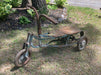 Vintage handcycle and antique item.